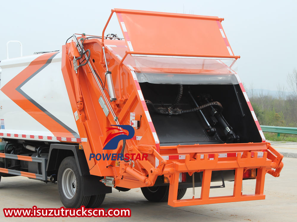 Isuzu trash compactor truck